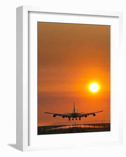 Aeroplane Landing At Sunset-David Nunuk-Framed Photographic Print