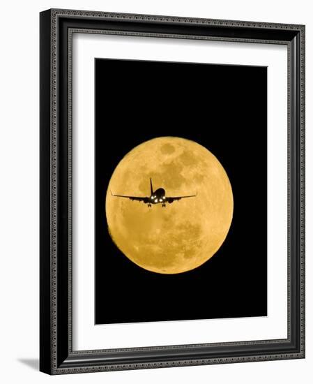Aeroplane Silhouetted Against a Full Moon-David Nunuk-Framed Photographic Print