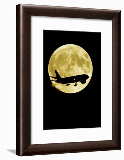 Aeroplane Silhouetted Against a Full Moon-David Nunuk-Framed Photographic Print