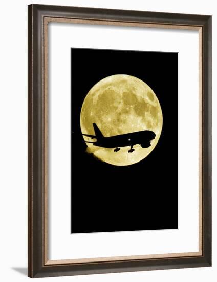 Aeroplane Silhouetted Against a Full Moon-David Nunuk-Framed Photographic Print