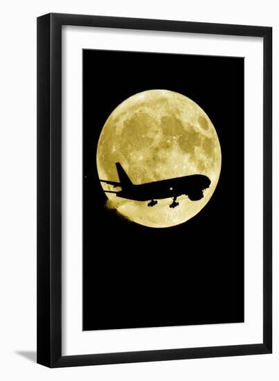 Aeroplane Silhouetted Against a Full Moon-David Nunuk-Framed Photographic Print