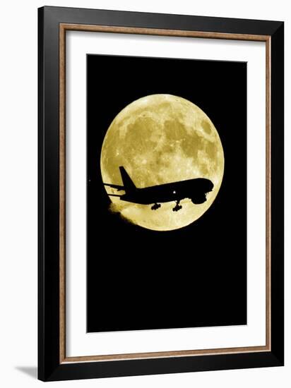 Aeroplane Silhouetted Against a Full Moon-David Nunuk-Framed Photographic Print