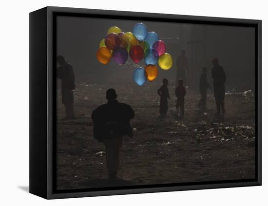 Afghan Boy Runs with Balloons to Join His Friends in Dusty Alley in Kabul, Afghanistan-null-Framed Premier Image Canvas