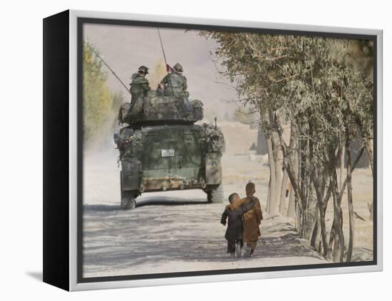 Afghan Boys Walk Along a Path While International Security Assistance Force (Isaf)-null-Framed Premier Image Canvas