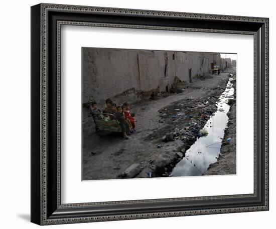 Afghan Children Sit Together Aboard an Old Cart-null-Framed Photographic Print