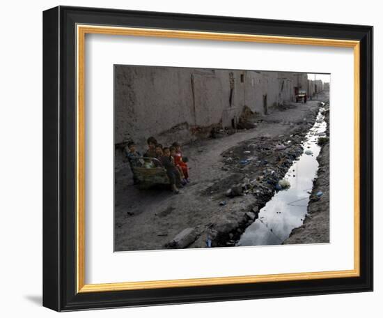 Afghan Children Sit Together Aboard an Old Cart-null-Framed Photographic Print