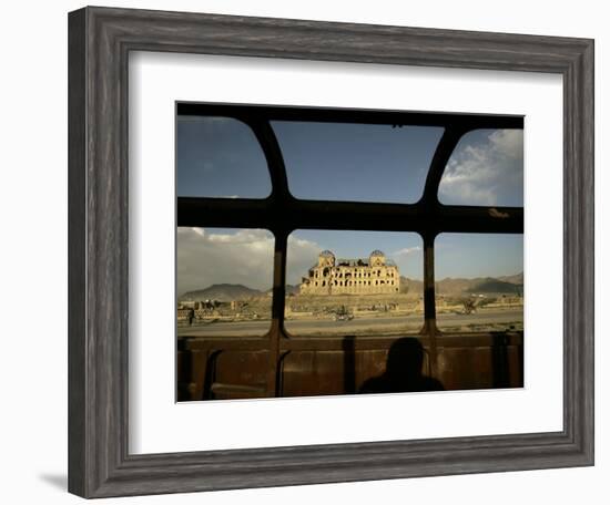 Afghan Drives Past the Darul Aman's Palace in the City of Kabul, Afghanistan-null-Framed Photographic Print