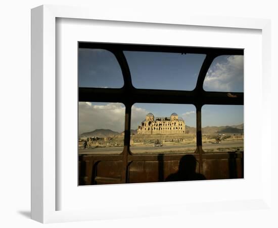 Afghan Drives Past the Darul Aman's Palace in the City of Kabul, Afghanistan-null-Framed Photographic Print