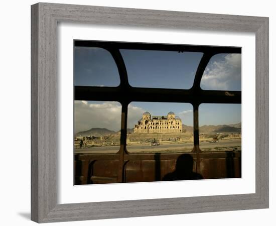 Afghan Drives Past the Darul Aman's Palace in the City of Kabul, Afghanistan-null-Framed Photographic Print