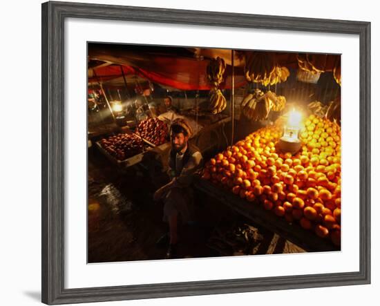 Afghan Fruit Vendor Waits for Customer at a Local Market in Kabul, Afghanistan-null-Framed Photographic Print