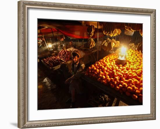 Afghan Fruit Vendor Waits for Customer at a Local Market in Kabul, Afghanistan-null-Framed Photographic Print