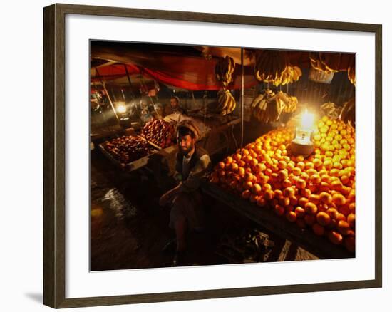 Afghan Fruit Vendor Waits for Customer at a Local Market in Kabul, Afghanistan-null-Framed Photographic Print