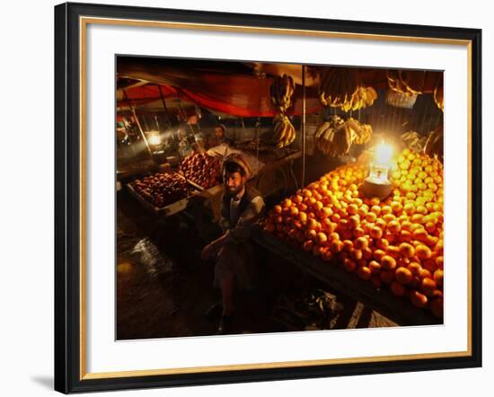 Afghan Fruit Vendor Waits for Customer at a Local Market in Kabul, Afghanistan-null-Framed Photographic Print