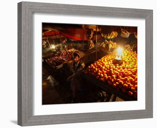 Afghan Fruit Vendor Waits for Customer at a Local Market in Kabul, Afghanistan-null-Framed Photographic Print