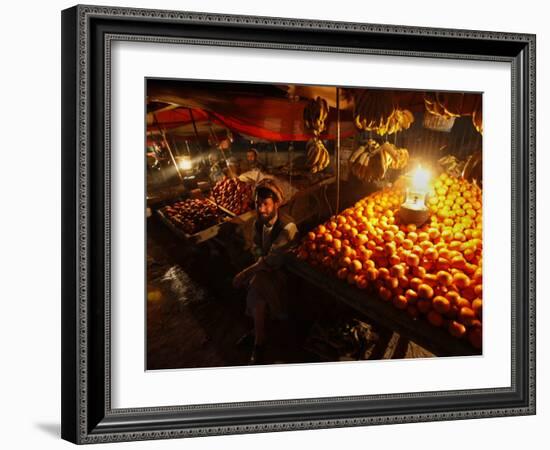 Afghan Fruit Vendor Waits for Customer at a Local Market in Kabul, Afghanistan-null-Framed Photographic Print