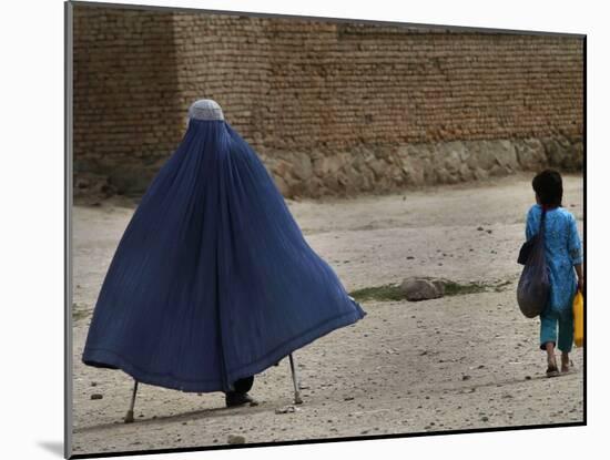 Afghan Girl Carries the Ration of Her Mother, a Victim of Land Mines, in Kabul, Afghanistan-null-Mounted Photographic Print
