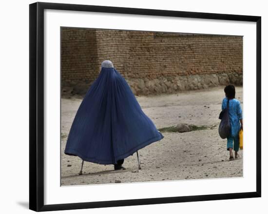 Afghan Girl Carries the Ration of Her Mother, a Victim of Land Mines, in Kabul, Afghanistan-null-Framed Photographic Print