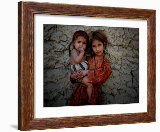 Afghan Girl Holds Her Younger Sister in Nangarhar Province, East of Kabul, Afghanistan-null-Framed Photographic Print