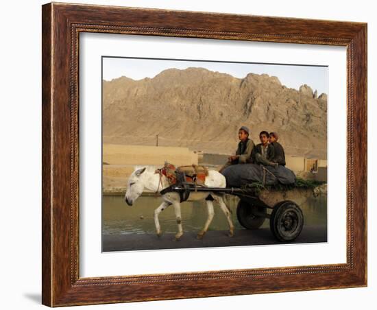 Afghan Kids Ride on a Horse Carriage in Kandahar City, Afghanistan-null-Framed Photographic Print