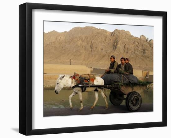 Afghan Kids Ride on a Horse Carriage in Kandahar City, Afghanistan-null-Framed Photographic Print