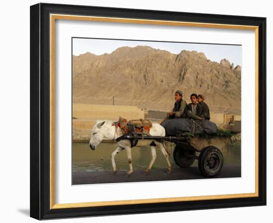 Afghan Kids Ride on a Horse Carriage in Kandahar City, Afghanistan-null-Framed Photographic Print