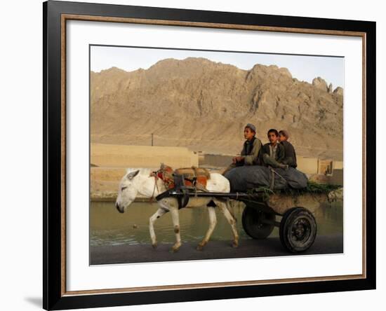 Afghan Kids Ride on a Horse Carriage in Kandahar City, Afghanistan-null-Framed Photographic Print