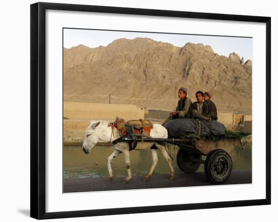 Afghan Kids Ride on a Horse Carriage in Kandahar City, Afghanistan-null-Framed Photographic Print