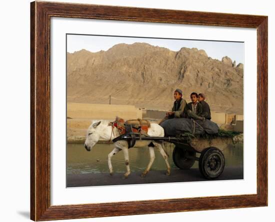 Afghan Kids Ride on a Horse Carriage in Kandahar City, Afghanistan-null-Framed Photographic Print