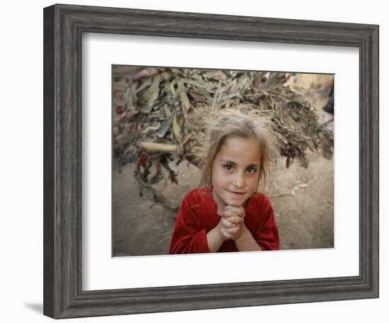 Afghan Refugee Child Looks on in a Neighborhood of Rawalpindi, Pakistan-null-Framed Premium Photographic Print