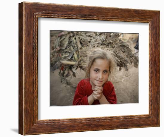 Afghan Refugee Child Looks on in a Neighborhood of Rawalpindi, Pakistan-null-Framed Premium Photographic Print