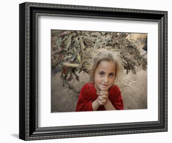Afghan Refugee Child Looks on in a Neighborhood of Rawalpindi, Pakistan-null-Framed Premium Photographic Print