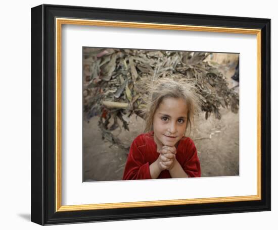 Afghan Refugee Child Looks on in a Neighborhood of Rawalpindi, Pakistan-null-Framed Premium Photographic Print