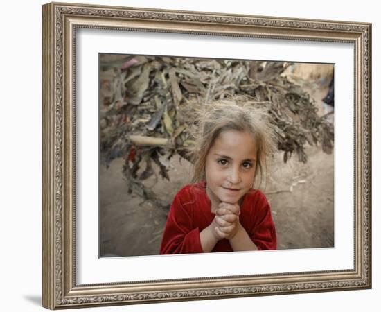 Afghan Refugee Child Looks on in a Neighborhood of Rawalpindi, Pakistan-null-Framed Photographic Print