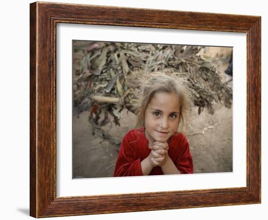Afghan Refugee Child Looks on in a Neighborhood of Rawalpindi, Pakistan-null-Framed Photographic Print