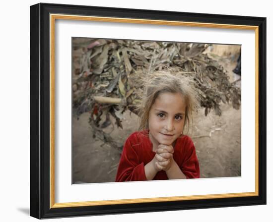 Afghan Refugee Child Looks on in a Neighborhood of Rawalpindi, Pakistan-null-Framed Photographic Print