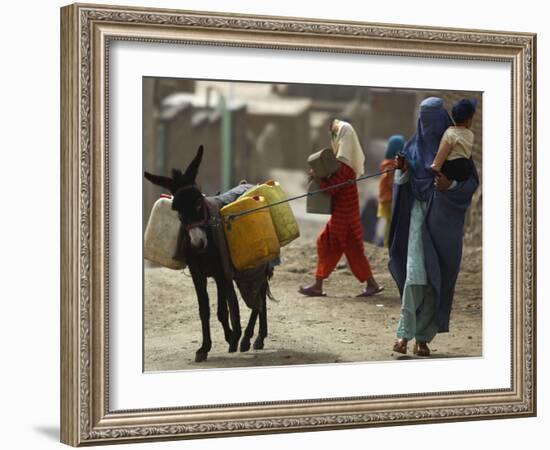 Afghan Woman Walks Along with Donkey Carrying Jerry Cans Filled with Water in Kabul, Afghanistan-null-Framed Photographic Print