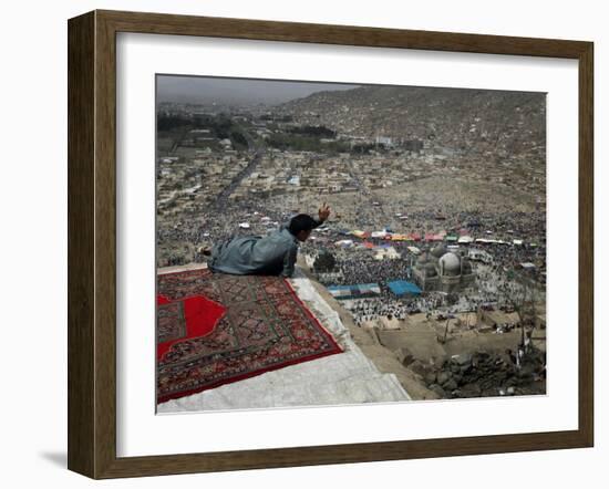 Afghan Youth Sits on a Rooftop During the Celebration of Nowruz-null-Framed Photographic Print