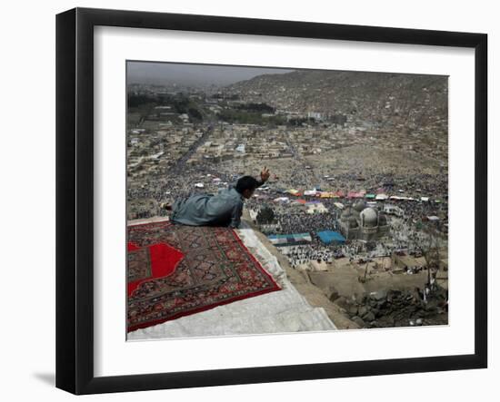 Afghan Youth Sits on a Rooftop During the Celebration of Nowruz-null-Framed Photographic Print