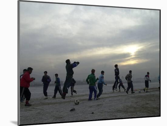 Afghan Youths Warm up Themselves Before a Soccer Match-null-Mounted Photographic Print