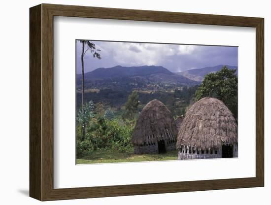 Africa, Ethiopia. Thatch huts of the Dorze tribe overlook the mountainous areas.-Janis Miglavs-Framed Photographic Print