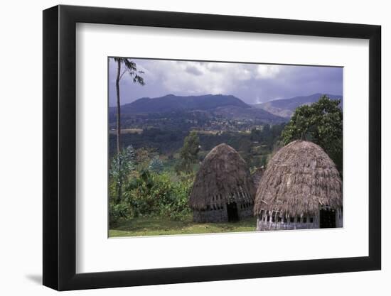 Africa, Ethiopia. Thatch huts of the Dorze tribe overlook the mountainous areas.-Janis Miglavs-Framed Photographic Print