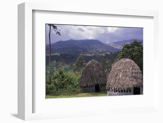 Africa, Ethiopia. Thatch huts of the Dorze tribe overlook the mountainous areas.-Janis Miglavs-Framed Photographic Print