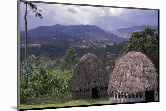 Africa, Ethiopia. Thatch huts of the Dorze tribe overlook the mountainous areas.-Janis Miglavs-Mounted Photographic Print