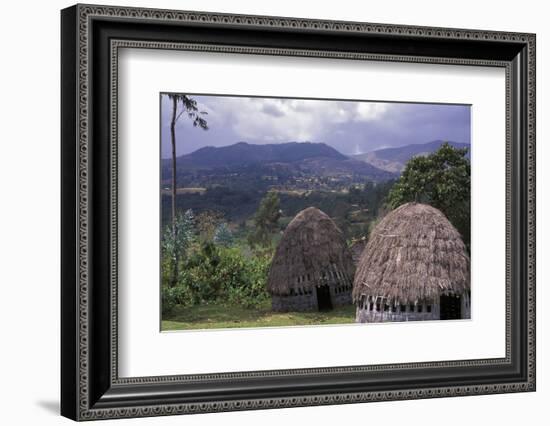 Africa, Ethiopia. Thatch huts of the Dorze tribe overlook the mountainous areas.-Janis Miglavs-Framed Photographic Print