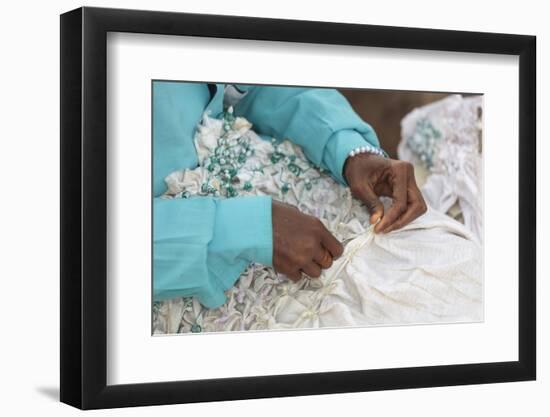 Africa, Gambia, Banjul. Close-up of Woman tying fabric for dyeing.-Alida Latham-Framed Photographic Print