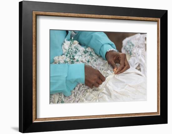 Africa, Gambia, Banjul. Close-up of Woman tying fabric for dyeing.-Alida Latham-Framed Photographic Print