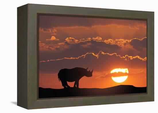 Africa, Kenya, Masai Mara Game Reserve. Composite of White Rhino Silhouette and Sunset-Jaynes Gallery-Framed Premier Image Canvas