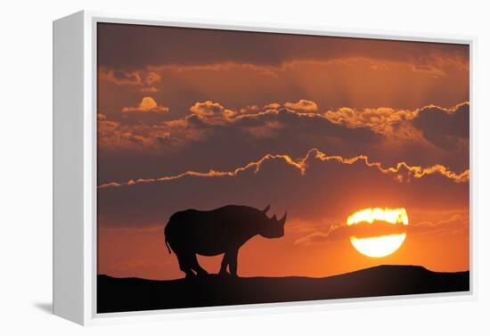 Africa, Kenya, Masai Mara Game Reserve. Composite of White Rhino Silhouette and Sunset-Jaynes Gallery-Framed Premier Image Canvas