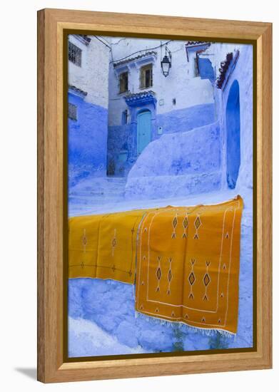 Africa, Morocco, Chefchaouen. Rugs Draped on a Wall in the Blue Town-Brenda Tharp-Framed Premier Image Canvas