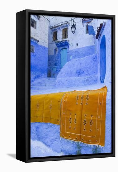 Africa, Morocco, Chefchaouen. Rugs Draped on a Wall in the Blue Town-Brenda Tharp-Framed Premier Image Canvas